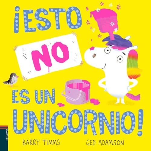 Portada del libro infantil "¡Esto NO es un Unicornio!" con un personaje de caricatura con melena y cola de colores arcoíris, sosteniendo un balde de pintura rosa.